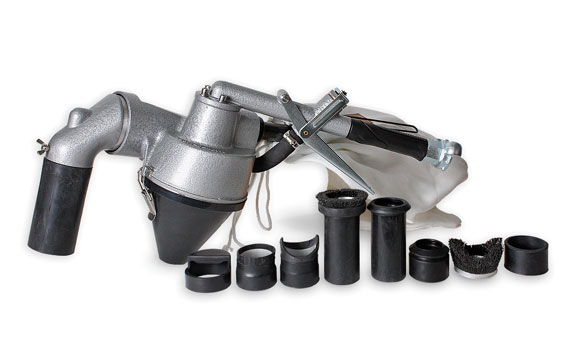 EDUCT-O-MATIC blasting unit with closed abrasive circuit. Set includes 6 rubber attachments and dust bag.